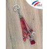 Bijou rouge pour licol ou sac