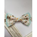 Noeud papillon petites fleurs sur fond aigue marine 