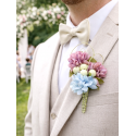 Boutonnière fleurs rose et bleue