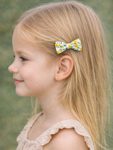 Barrette noeud papillon tissu Liberty jaune