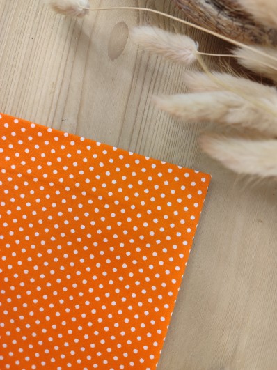 Pochette de costume orange à pois blancs