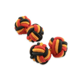 Knot 610 - Bouton de manchette en Passementerie rouge, noire et orangée.