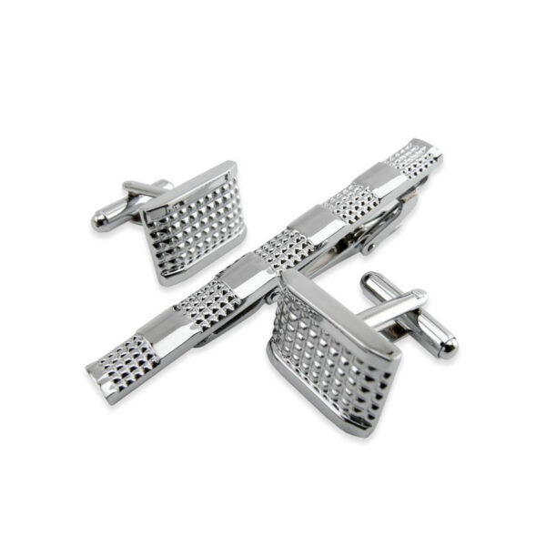 Pince à cravate et boutons de manchette chromé à pointes de diamants.