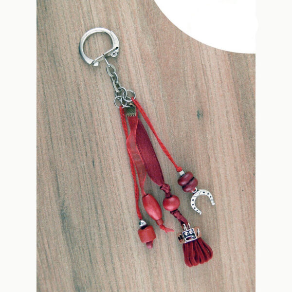 Bijou rouge pour licol ou sac