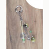 Bijou porte bonheur vert pour licol / sac
