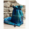 Sacs étriers bleu et vert à carreaux