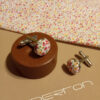 Boutons de manchette vert et rose à fleurs