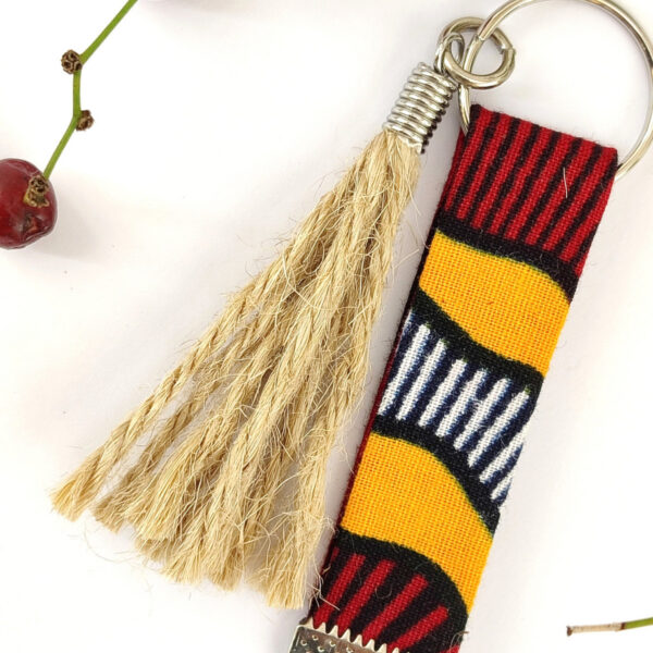 Porte clés Wax et pompon