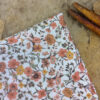 Pochette costume à fleurs orange brûlée