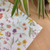 Pochette costume vert tendre à fleurs