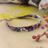 Bracelet tissu bordeaux à fleurs