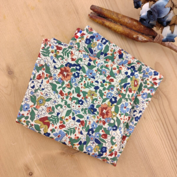 Pochette costume fleuri bleu, terracotta et vert