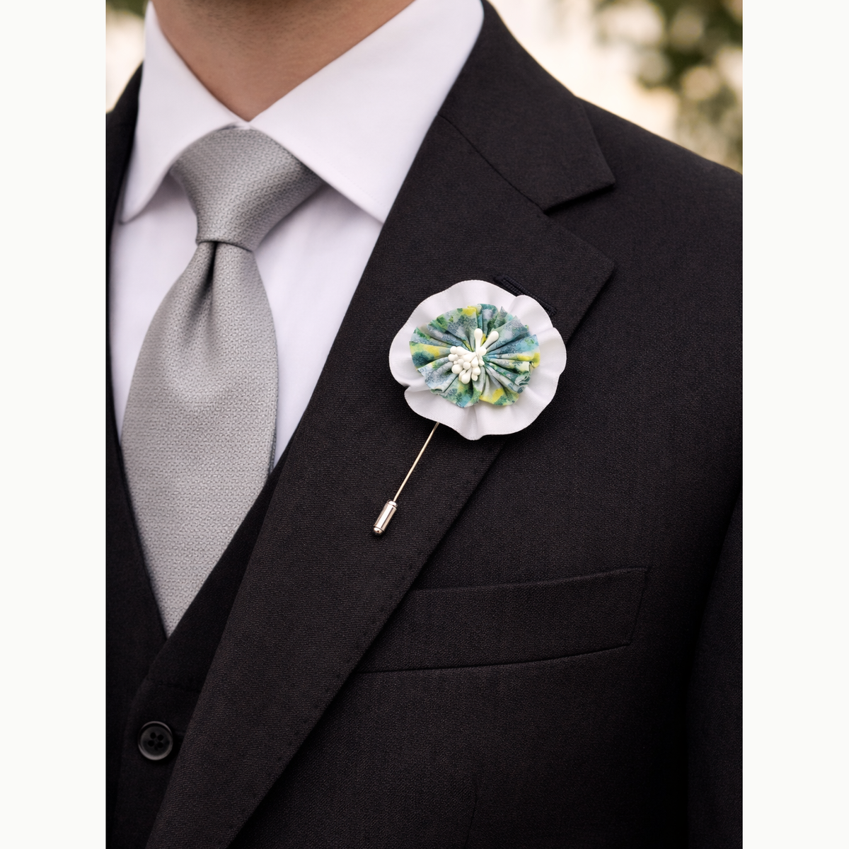 Boutonnière tissu floral vert