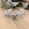 Bracelet tissu Liberty violet avec feuillage résine