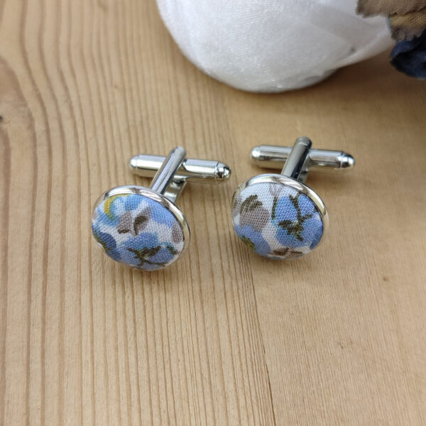 Boutons de manchettes à fleurs bleues