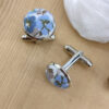 Boutons de manchettes à fleurs bleues