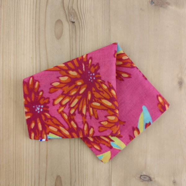 Pochette de costume floral orange et fuchsia