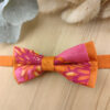 Noeud papillon enfant orange brûlée et fuchsia fleuri