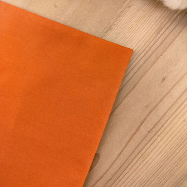 Pochette de costume en coton orange brûlée uni
